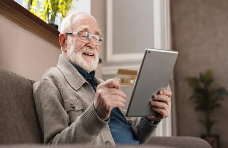 modern-elderly-man-grandfather-shopping-online-wit-2023-11-27-05-09-39-utc (1) (1)
